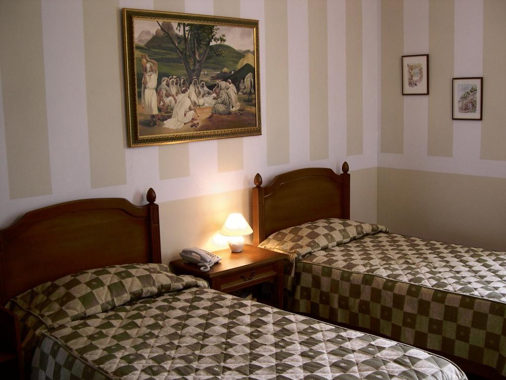 Hotel Piccolo Mondo Bucarest Chambre photo